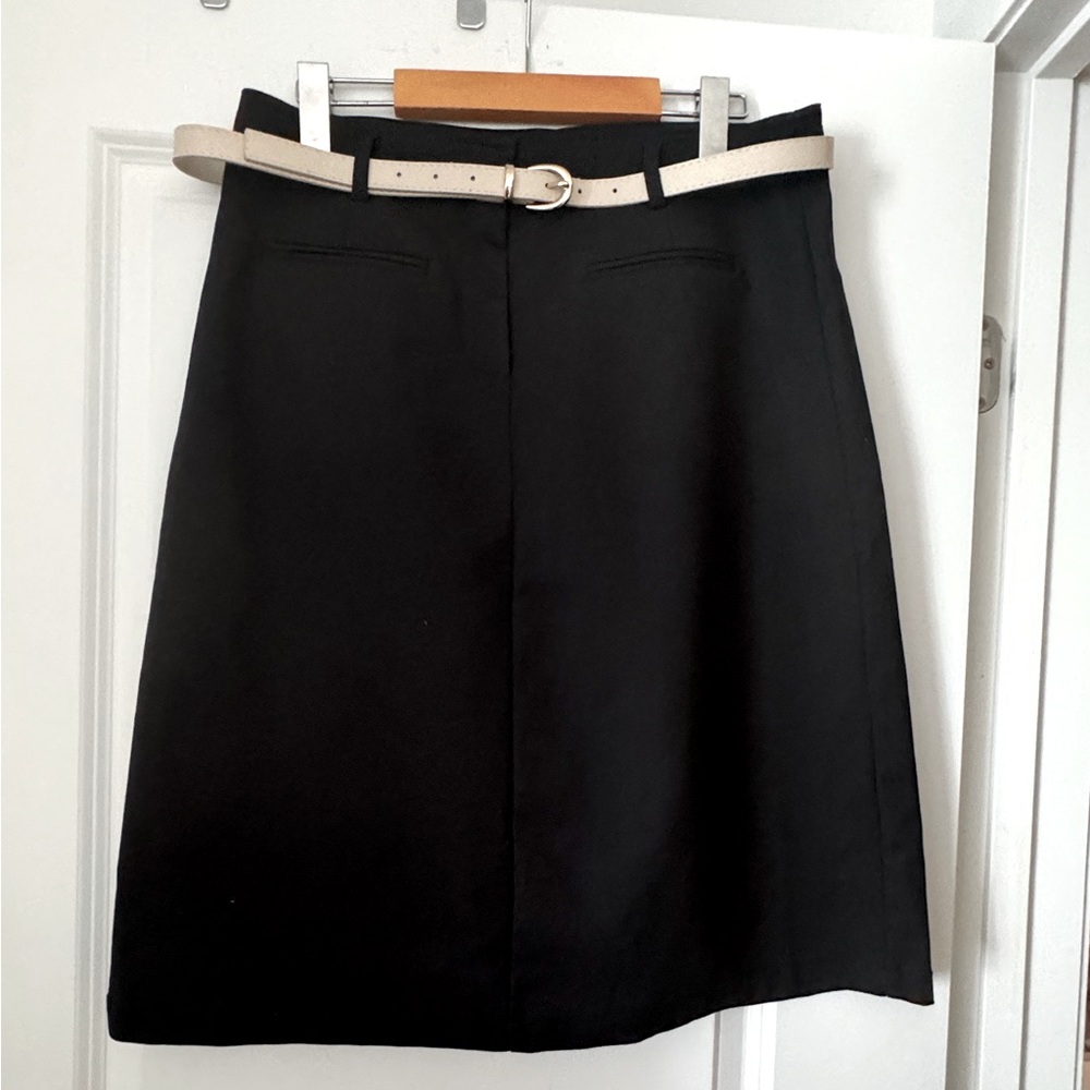 straight black skirt with belt
